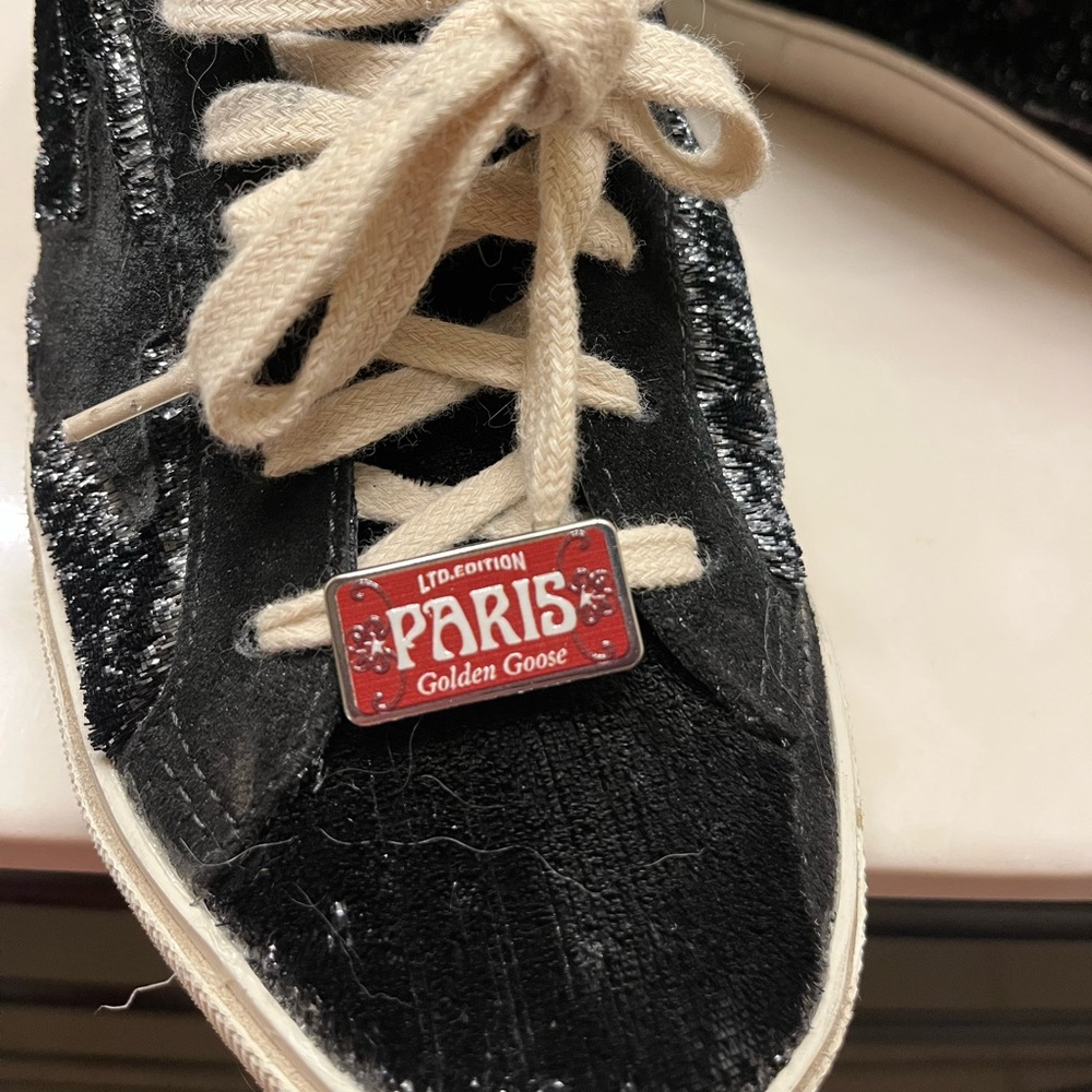 Golden Goose Black Sneakers with Cream Laces and Red Paris Charm